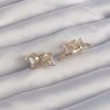 Bouquet Boutique Pirinç Gold Renk İri Zirkon Taşlı Kıvrımlı Minimal Kelebekli Halka Küpe