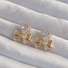 Bouquet Boutique Pirinç Gold Renk Zirkon Taşlı Kalp Model Fiyonk Küpe