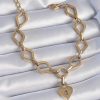 Bouquet Boutique 316L Çelik Gold Renk Zincir Model Kilit Kalp Figür Kadın Bileklik