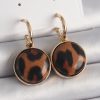 Bouquet Boutique Pirinç Gold Renk Leopar Desenli Daire Model Kadın Küpe