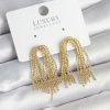 Bouquet Boutique Pirinç Gold Renk Sallantılı  Küpe