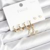 Bouquet Boutique Gold Renk Pirinç Kelebek Model 925 Ayar Gümüş Çivili  Küpe Seti