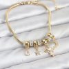 Bouquet Bouqtique Pirinç Gold Renk Kalpli Model Charmlı Kadın Bileklik BQT35BB8177