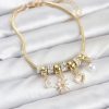Bouquet Bouqtique Pirinç Gold Renk Kutup Yıldızı ve Kalp Charmlı Kadın Bileklik BQT35BB8181