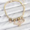 Bouquet Bouqtique Pirinç Gold Renk Kanatlı Charmlı Kadın Bileklik BQT35BB8199
