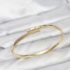 Bouquet Bouqtique Pirinç Gold Renk Zirkon Taşlı Kadın Kelepçe Bileklik BQT35BB8223