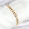Bouquet Bouqtique Pirinç Gold Renk VIP Seri Sarmal Damla Model Zirkon Taşlı Kadın Bileklik BQT35BB8268