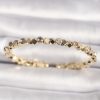 Bouquet Bouqtique Pirinç Gold Renk Zirkon Taşlı Küp Dorika Model Kadın Bileklik BQT35BB6635