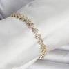 Bouquet Bouqtique Pirinç Gold Renk Yonca Model Sıralı Zirkon Taşlı Kadın Bileklik BQT35BB8427