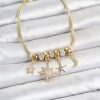 Bouquet Bouqtique Pirinç Gold Renk Kutup Yıldızı Detaylı Charmlı Kadın Bileklik BQT35BB8454