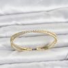 Bouquet Bouqtique Pirinç Gold Renk Zirkon Taşlı Çapraz Model Kadın Bileklik BQT35BB8513
