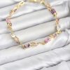 Bouquet Bouqtique Pirinç Gold Renk Pembe ve Mor Zirkon Taşlı Çiçek Model Kadın Bileklik BQT35BB8585