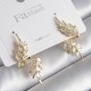 Bouquet Bouqtique Pirinç Gold Renk Zirkon Taşlı Yaprak Model Kadın Küpe BQT35BKP9945