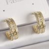 Bouquet Bouqtique Pirinç Gold Renk Zirkon Taşlı İşleme Detay Halka Model Kadın Küpe BQT35BKP9913