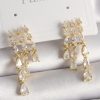 Bouquet Bouqtique Pirinç Gold Renk Zirkon Taşlı Yağmur Model Kadın Küpe BQT35BKP9935