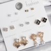 Bouquet Bouqtique Pirinç Gold Renk Zirkon Taşlı Kalp Figür Siyah Yonca Detay 7 Çift Kadın Küpe Seti BQT35BKP10541
