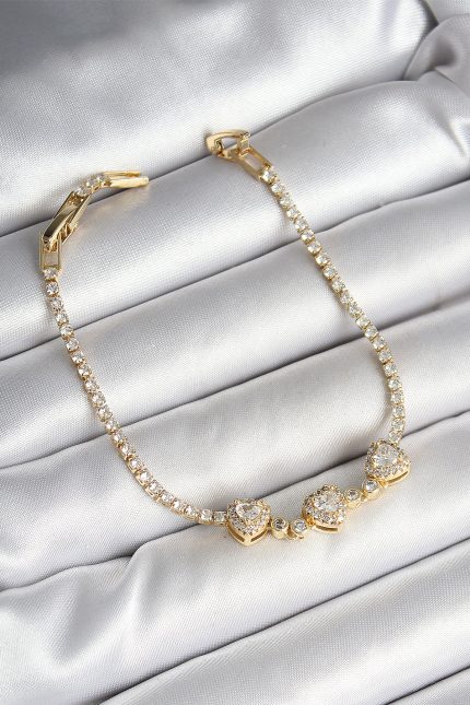 Bouquet Bouqtique Pirinç Sıralı Kalp Figürlü Zirkon Taşlı Gold Renk Kadın Bileklik BQT35BB6981