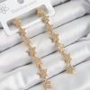 Bouquet Bouqtique Pirinç Zirkon Taşlı Sallantılı Yıldız Model Gold Renk Kadın Küpe BQT35BKP10912