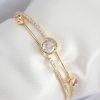 Bouquet Bouqtique Pirinç Zirkon Taşlı Pırlanta Model Gold Renk Kadın Bileklik BQT35BB7879