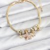 Bouquet Bouqtique Pirinç Gold Renk Renkli Yıldız Charmlı Kadın Bileklik BQT35BB8187