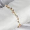 Bouquet Bouqtique Pirinç Gold Renk Çiçek Sarmaşık Model Kadın Bileklik BQT35BB8433