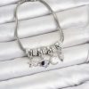 Bouquet Bouqtique Pirinç Gümüş Renk Göz Detaylı Charmlı Kadın Bileklik BQT35BB8459