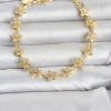 Bouquet Bouqtique Pirinç Gold Renk Zirkon Taşlı Sıralı Yıldız Model Kadın Bileklik BQT35BB8493