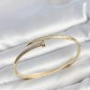 Bouquet Bouqtique Gold Renk Çivi Model Zirkon Taşlı Kadın Kelepçe Bileklik BQT35BB8629