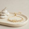 Bouquet Bouqtique Gold Renk Zirkon Taşlı Pirinç Sedefli Çiçek Model Asansörlü Bileklik BQT35BB8834