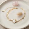 Bouquet Bouqtique Gold Renk Pirinç Ataç ve Puntalı Zincirli Deniz Kabuğu Model Kadın Bileklik BQT35BB8844