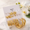 Bouquet Bouqtique Gold Renk Metalik Kaplamalı Deniz Kabuğu Detaylı CCB 9 Çift Küpe Seti BQT35BKP12104