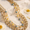 Bouquet Bouqtique Gold Renk Samanyolu Zincir Papatya ve Nazarlı Model Kombin Kadın Kolye BQT35BKO11256